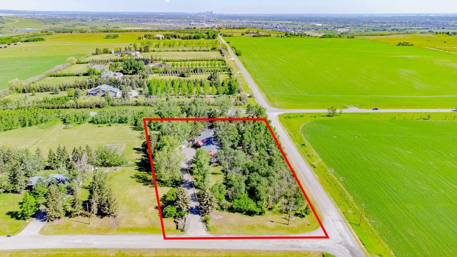 Property Photo: 48010 244 Avenue W AB T1S 4C5