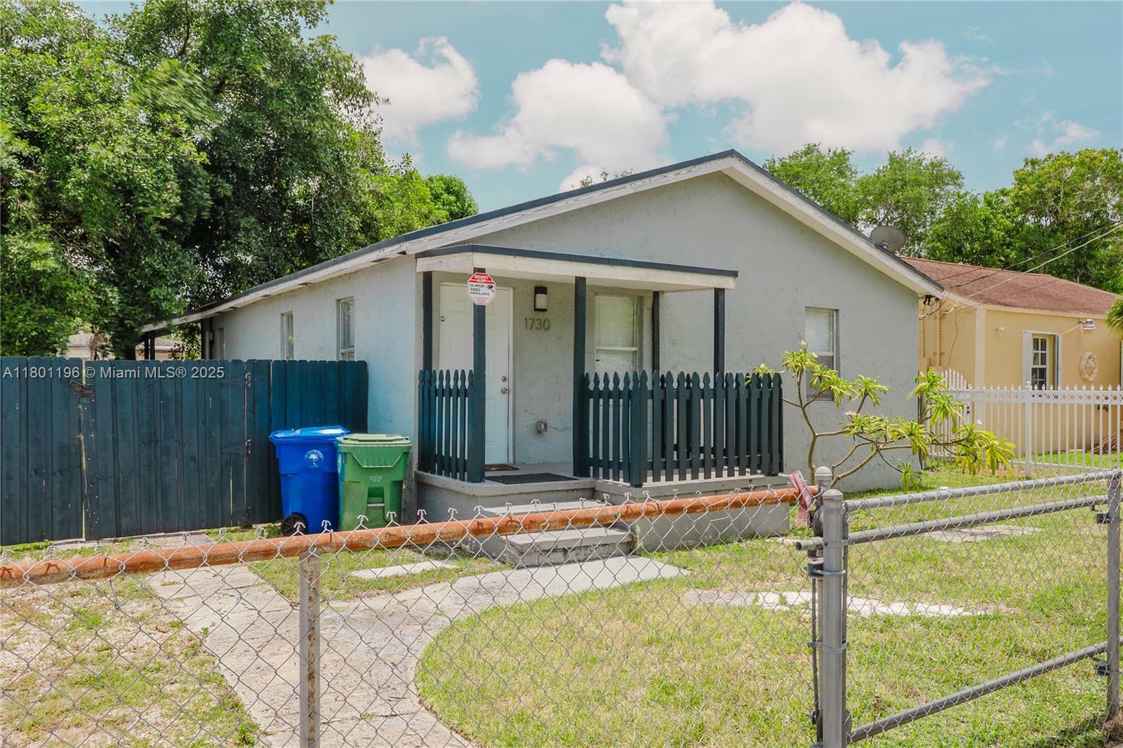 Property Photo: 1730 NW 58th St FL 33142