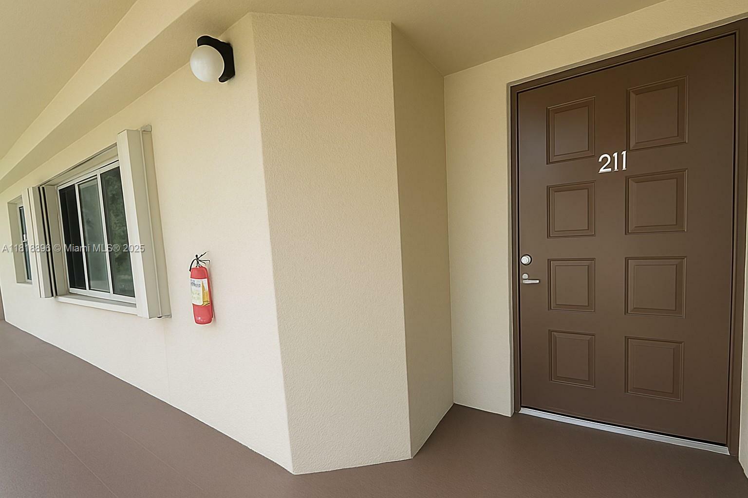 Property Photo: 800 SW 142nd Ave 211N FL 33027