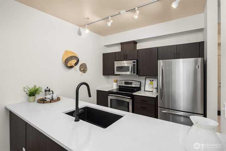 Property Photo: 300 110th Avenue NE 303 WA 98004