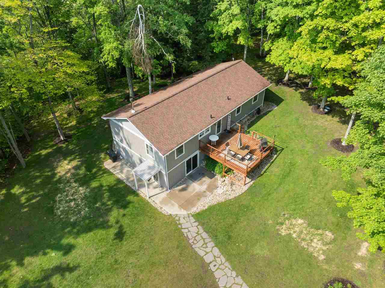 Property Photo:  8516 Major Douglas Sloan  MI 49729 