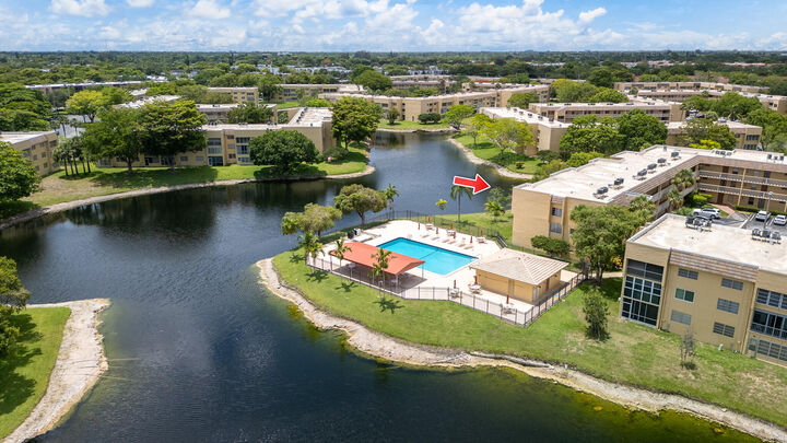 Property Photo:  5961 NW 61st Avenue 203  FL 33319 