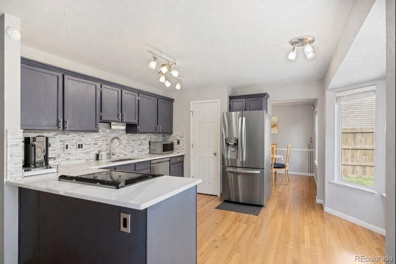 Property Photo: 15157 E Nassau Avenue CO 80014