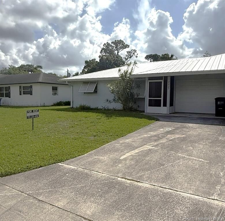 Property Photo: 2427 NW Holiday Court FL 34994
