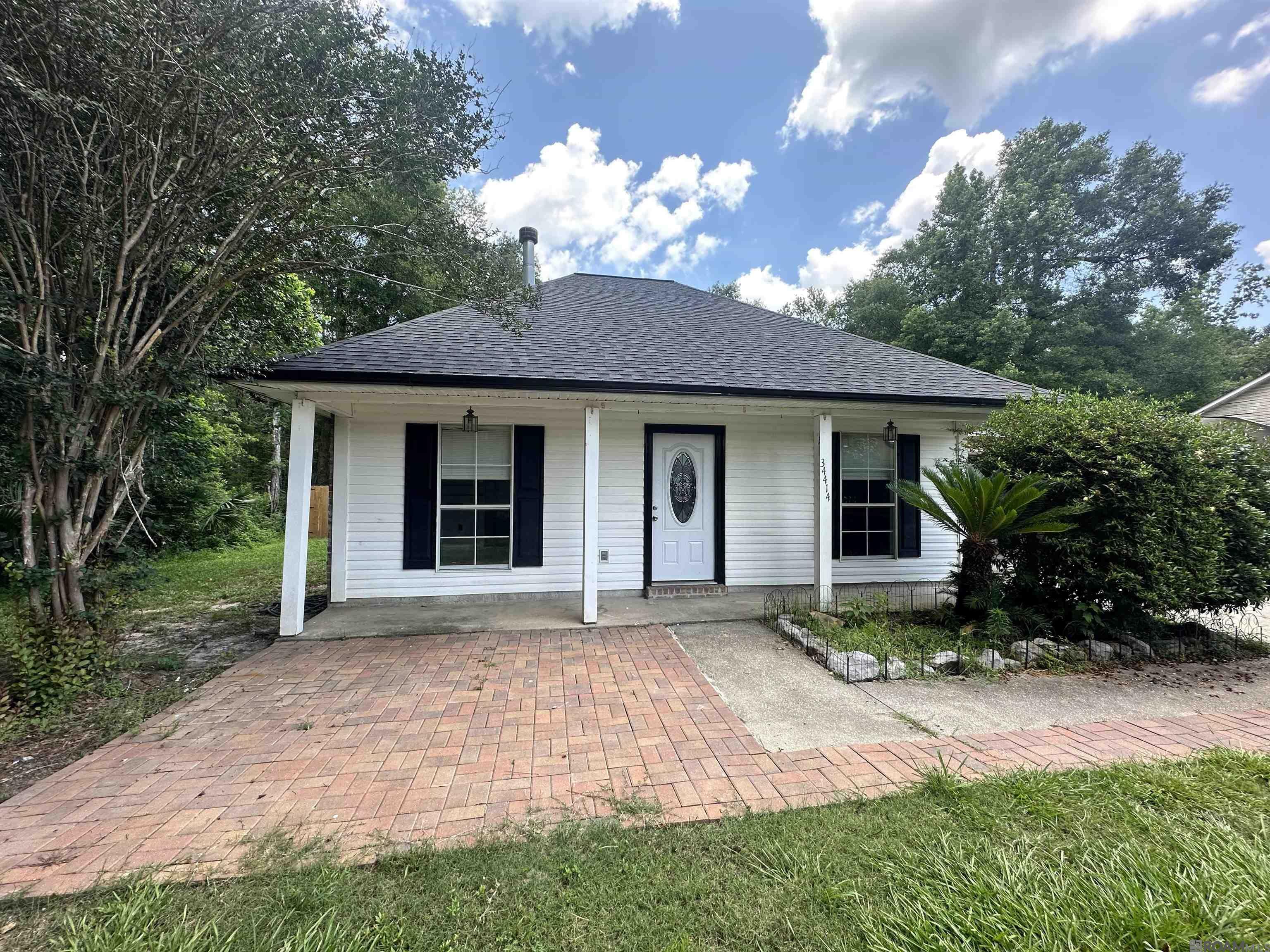 Property Photo:  34414 Woodland Trail Dr  LA 70706 