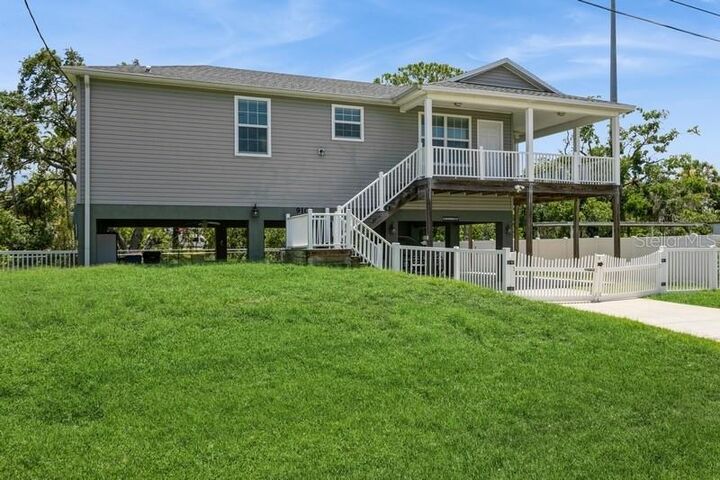 Property Photo: 9107 Brunswick Lane FL 33615