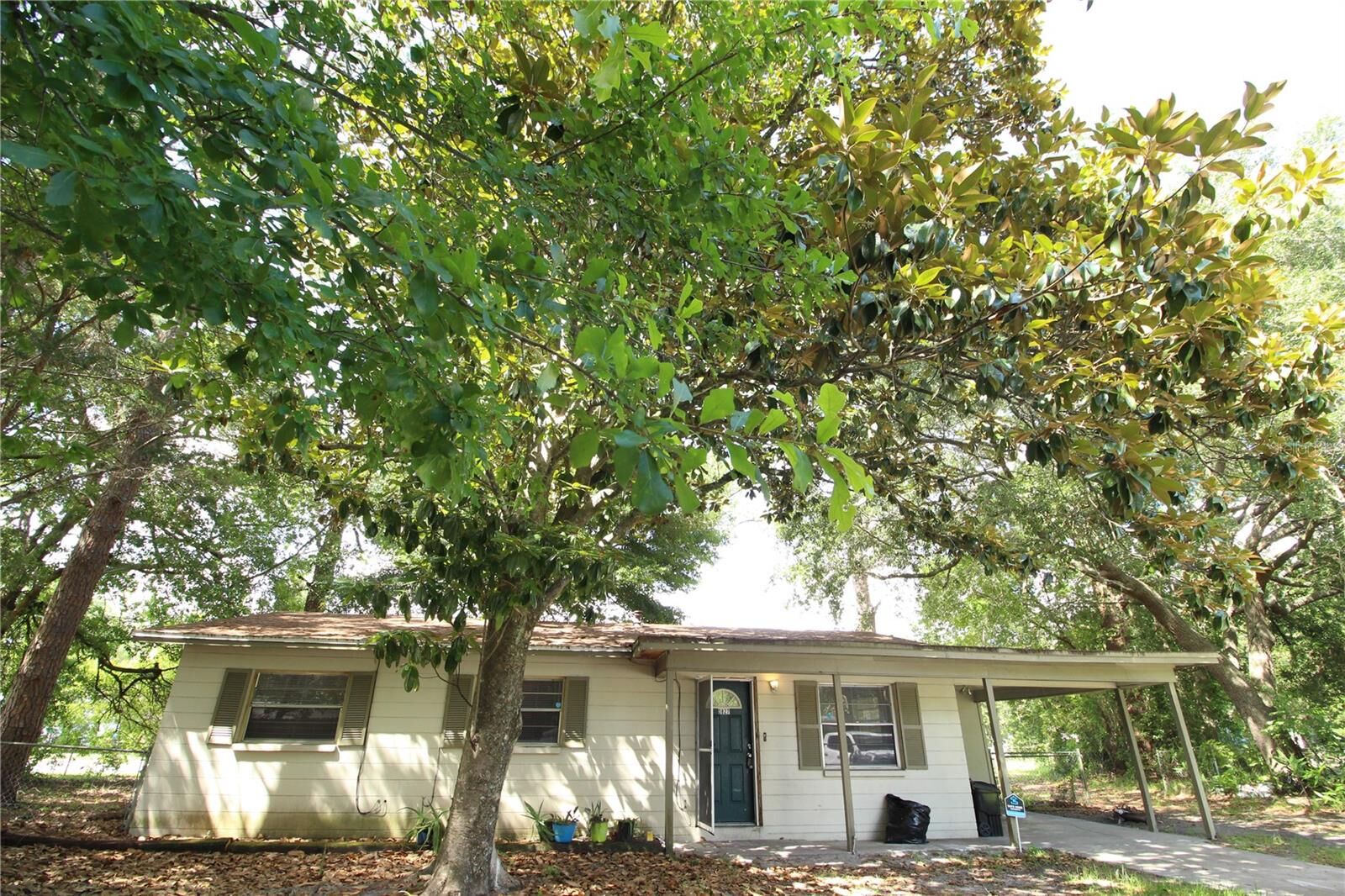 Property Photo:  3827 NE 13th Drive  FL 32609 