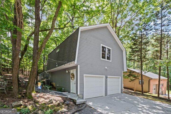 Property Photo:  115 Leaf Lake Drive  GA 30024 