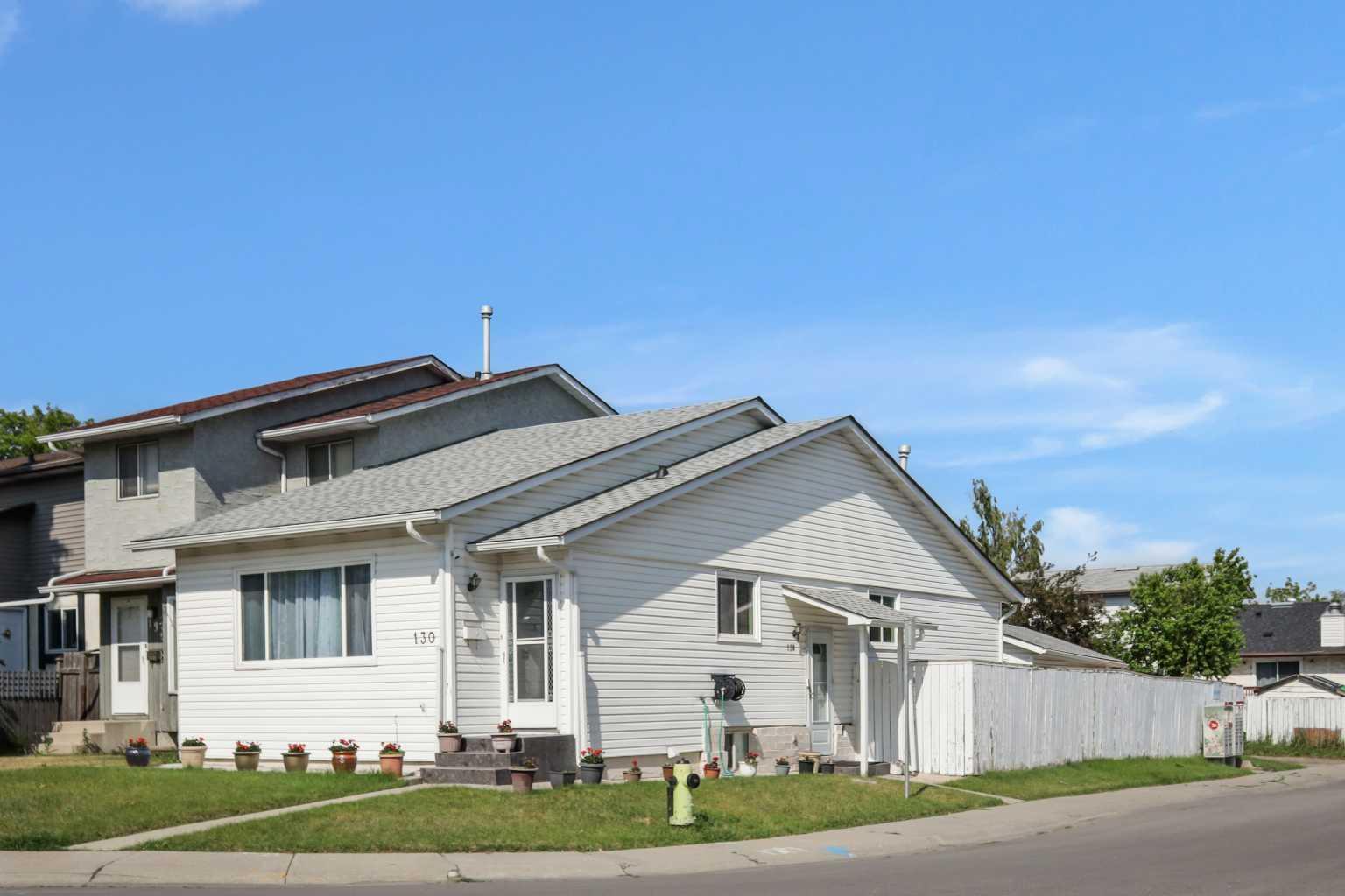 Property Photo:  130 Pinemeadow Road NE  AB T1Y 4N9 