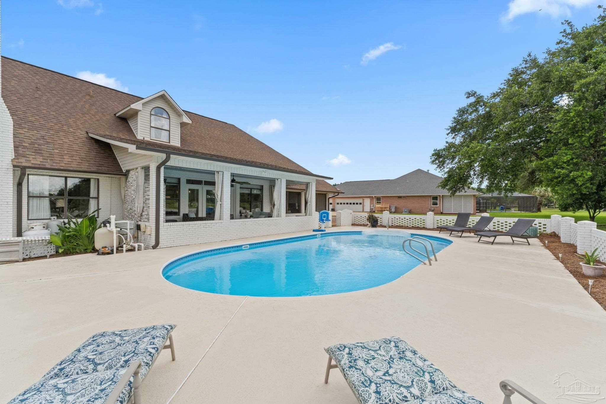 Property Photo:  5624 Firestone Dr  FL 32571 