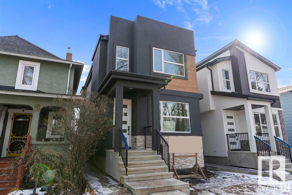 Property Photo: 10965 129 Street NW AB T5M 0Y2