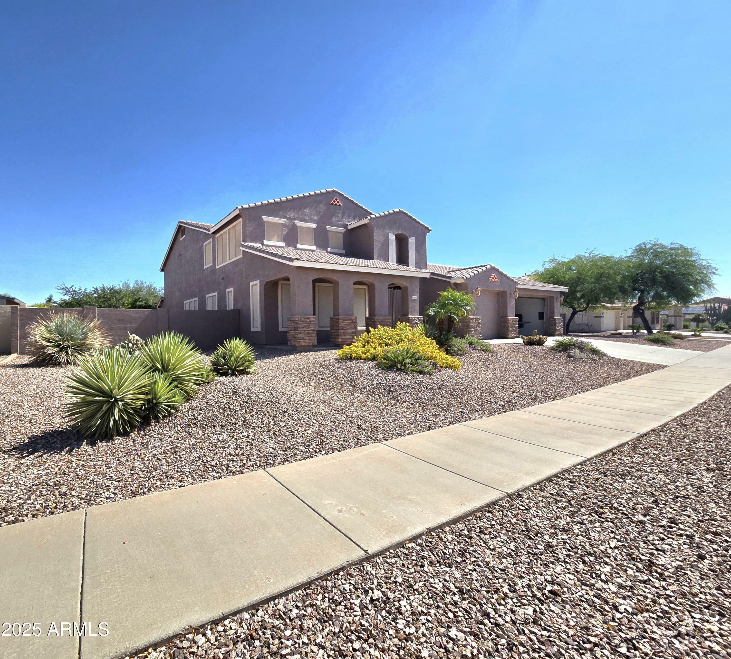 Property Photo: 15656 W Desert Mirage Drive AZ 85379