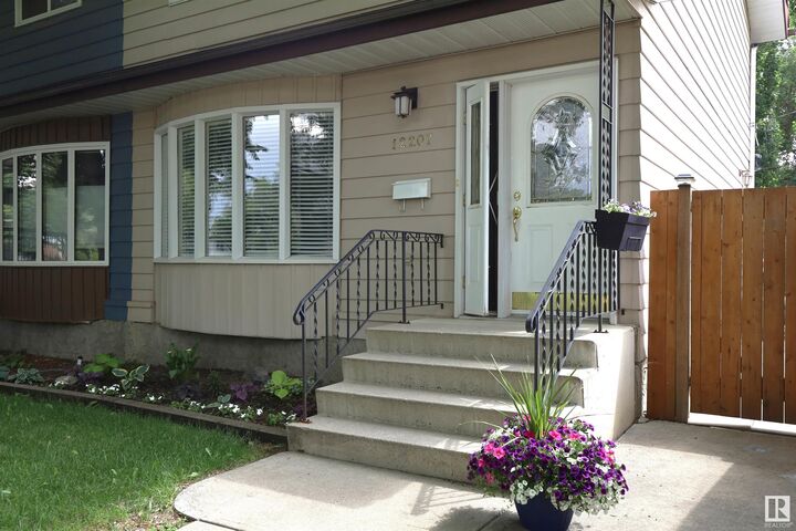 Property Photo:  12207 109A Avenue NW  AB T5M 2H4 