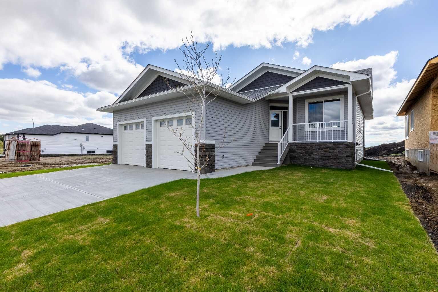 Property Photo:  3438 Victory Way  AB T4H 0G8 