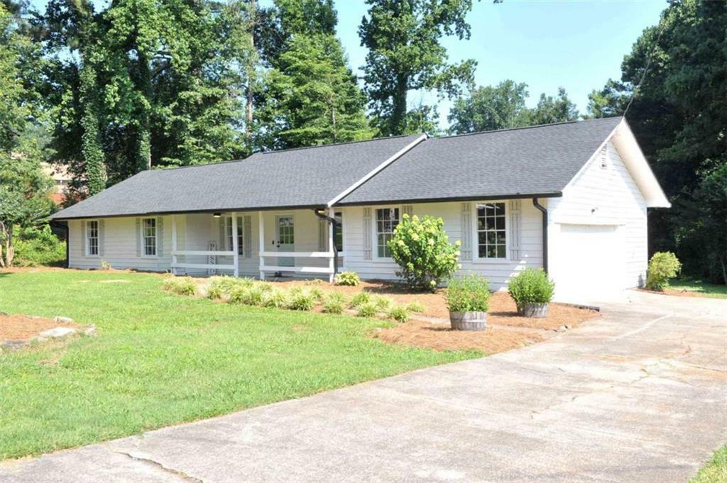 Property Photo: 5974 SW Four Winds Drive SW GA 30047