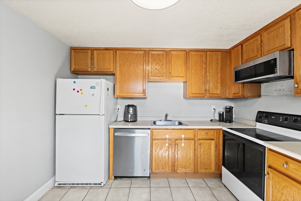 Property Photo:  271 Humphrey St H2  MA 01850 