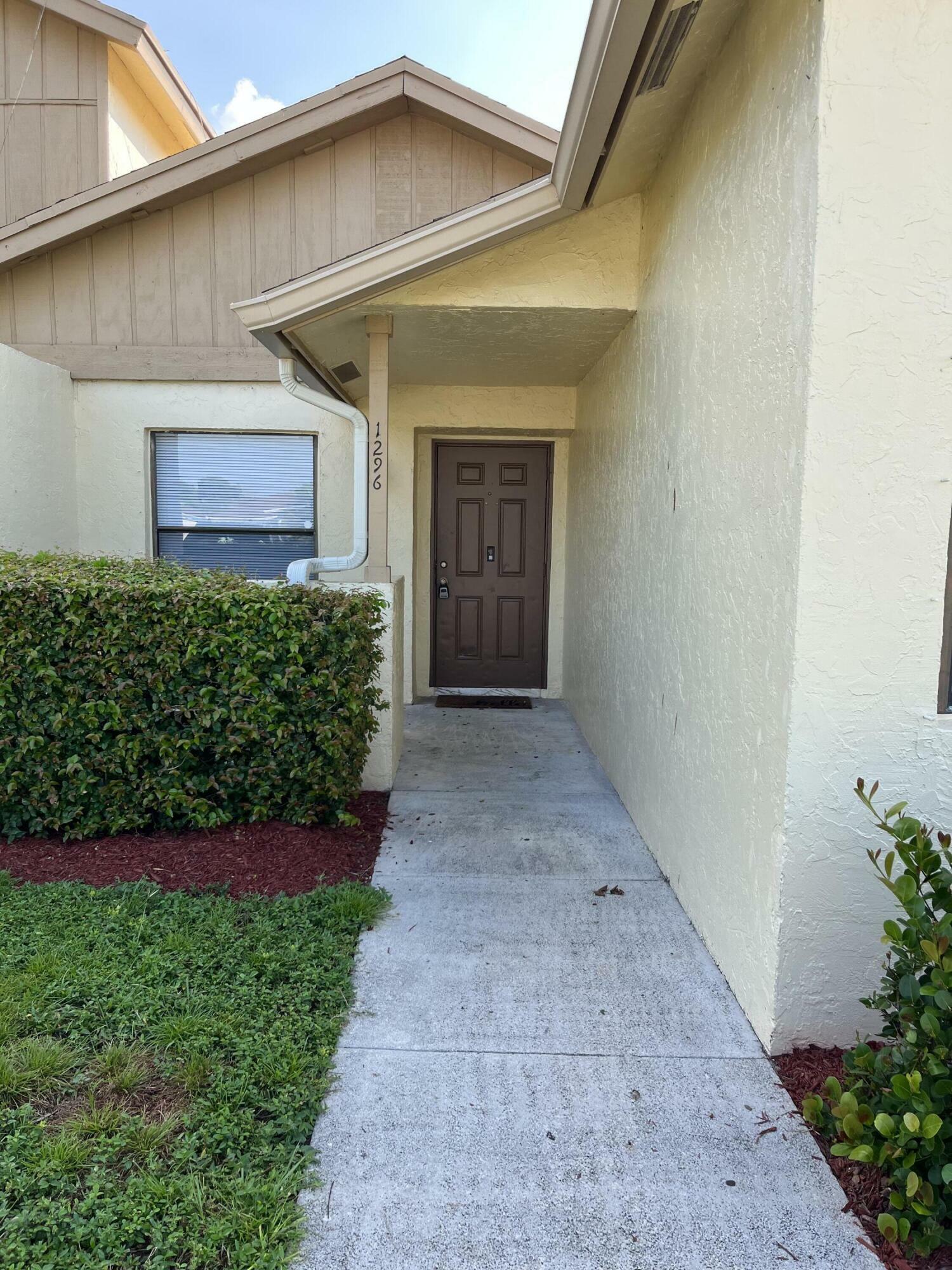 Property Photo: 1296 White Pine Drive FL 33414