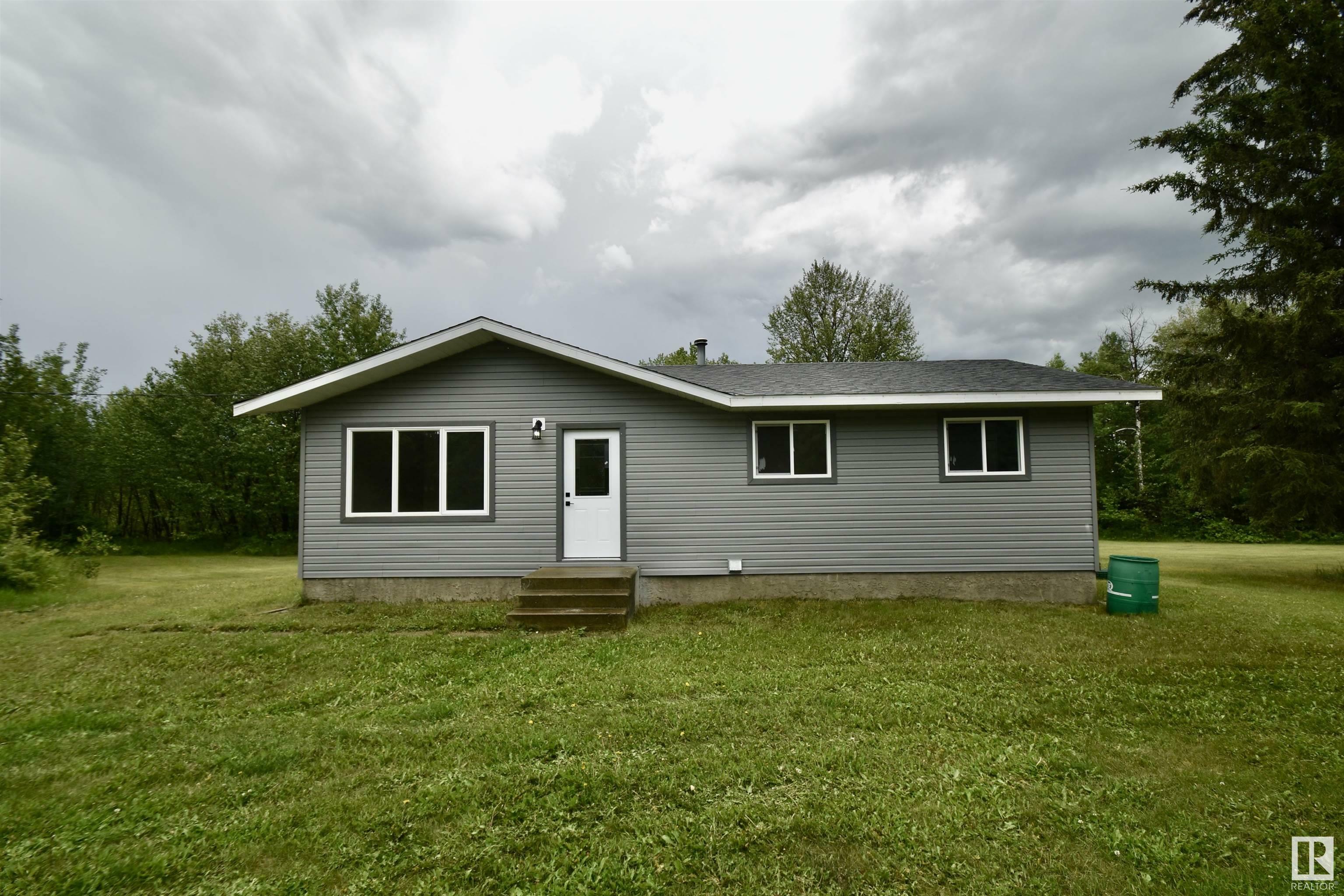 Property Photo: 3 13239 Twp Rd 615 AB T0A 3C0
