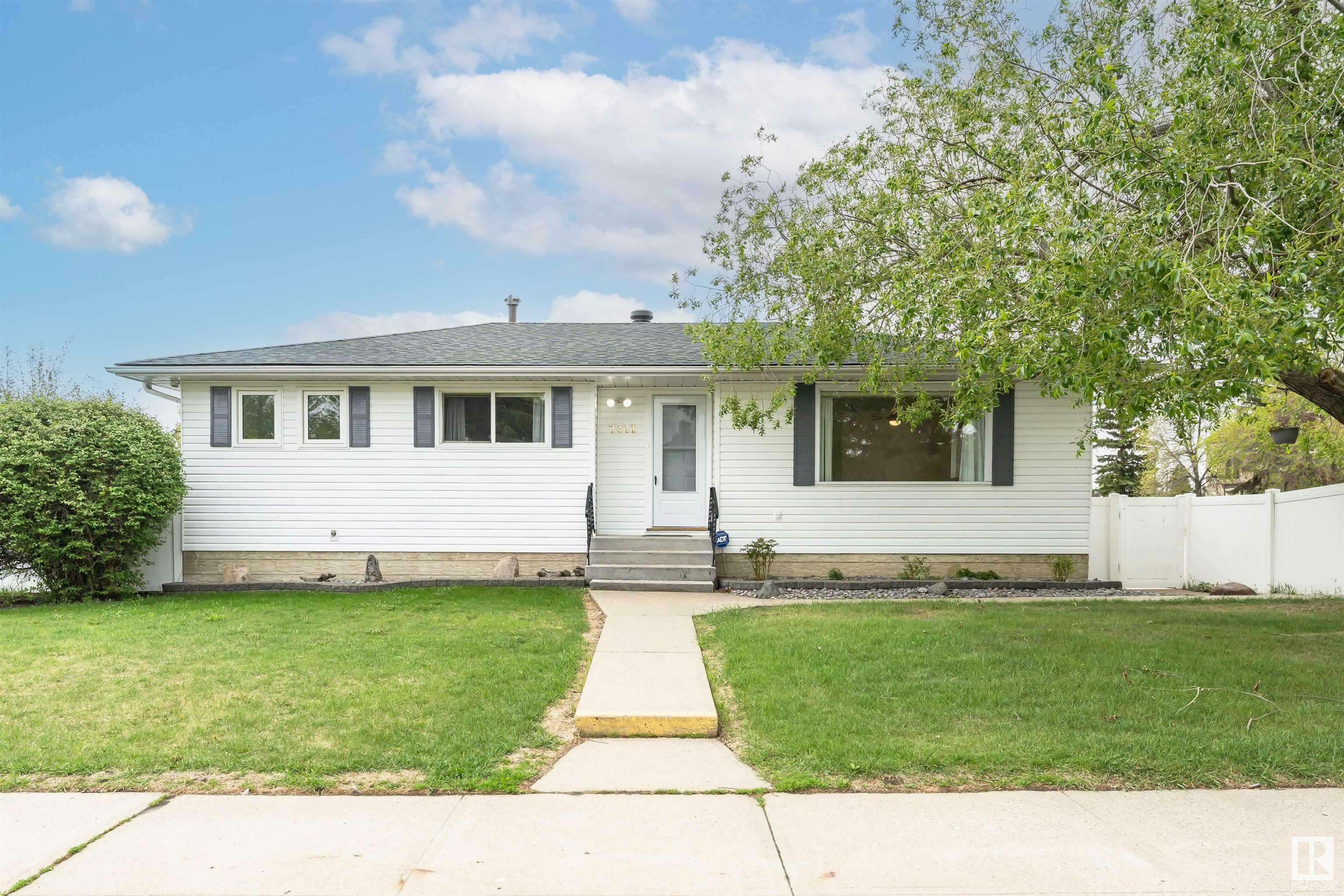 Property Photo: 7311 138 Avenue NW AB T5C 2L9