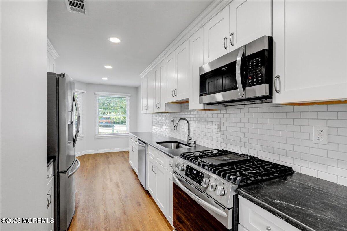 Property Photo:  3 Sloop Square  NJ 07728 