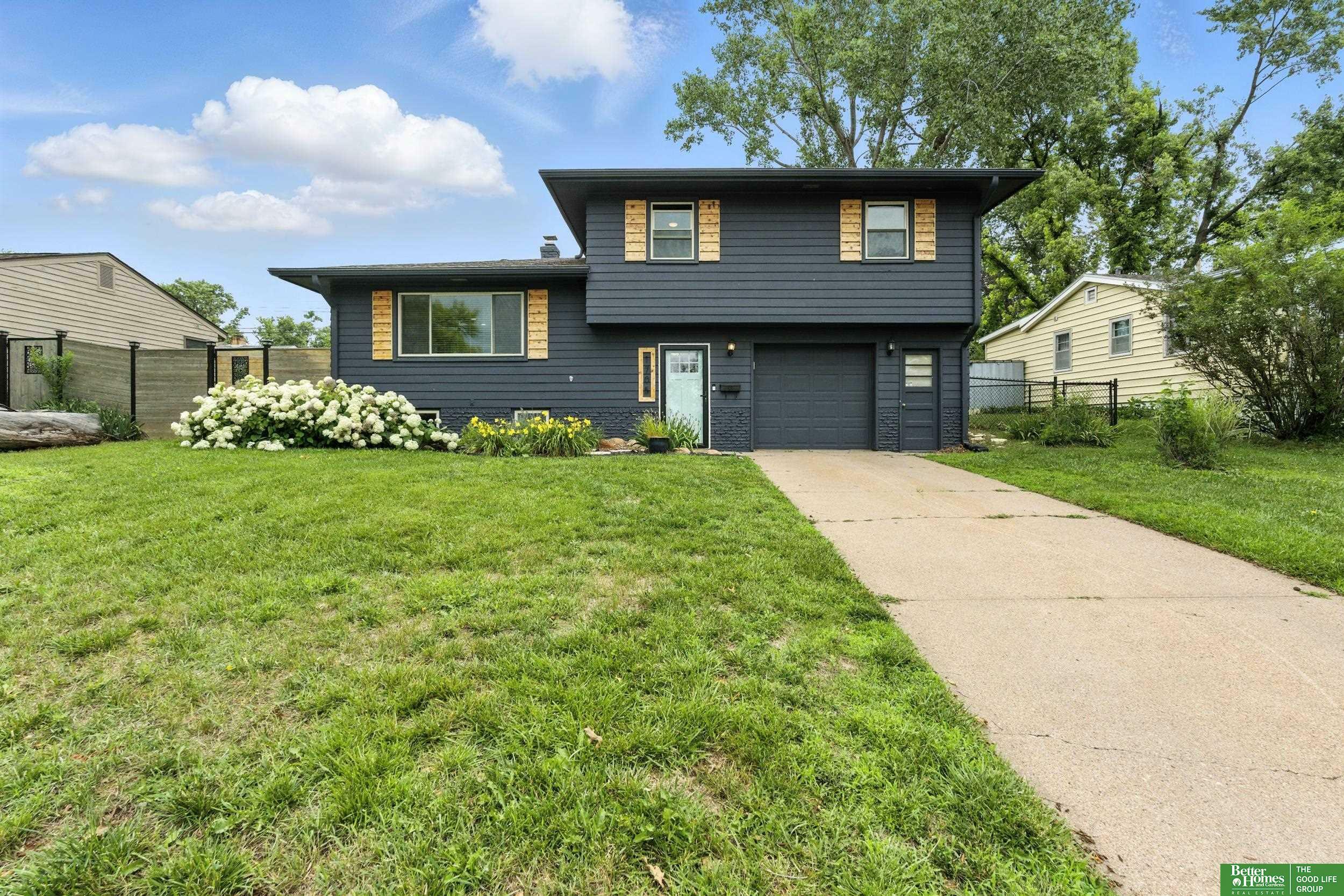 Property Photo:  1705 Hillside Drive  NE 68114 