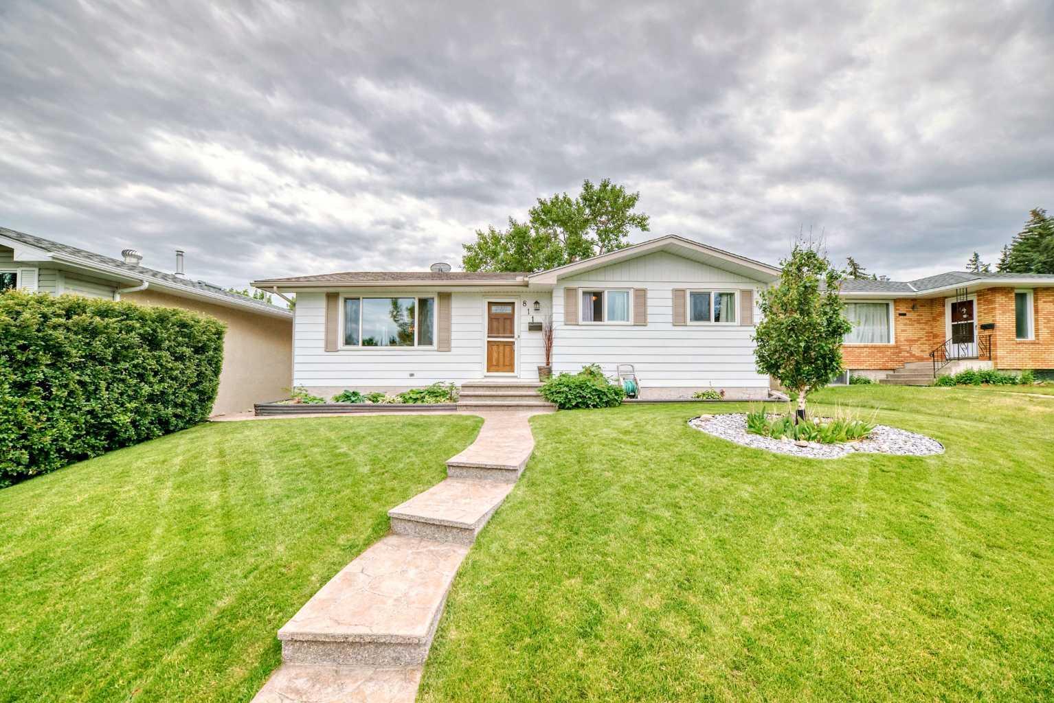 Property Photo: 811 71 Avenue NW AB T2K 0N6