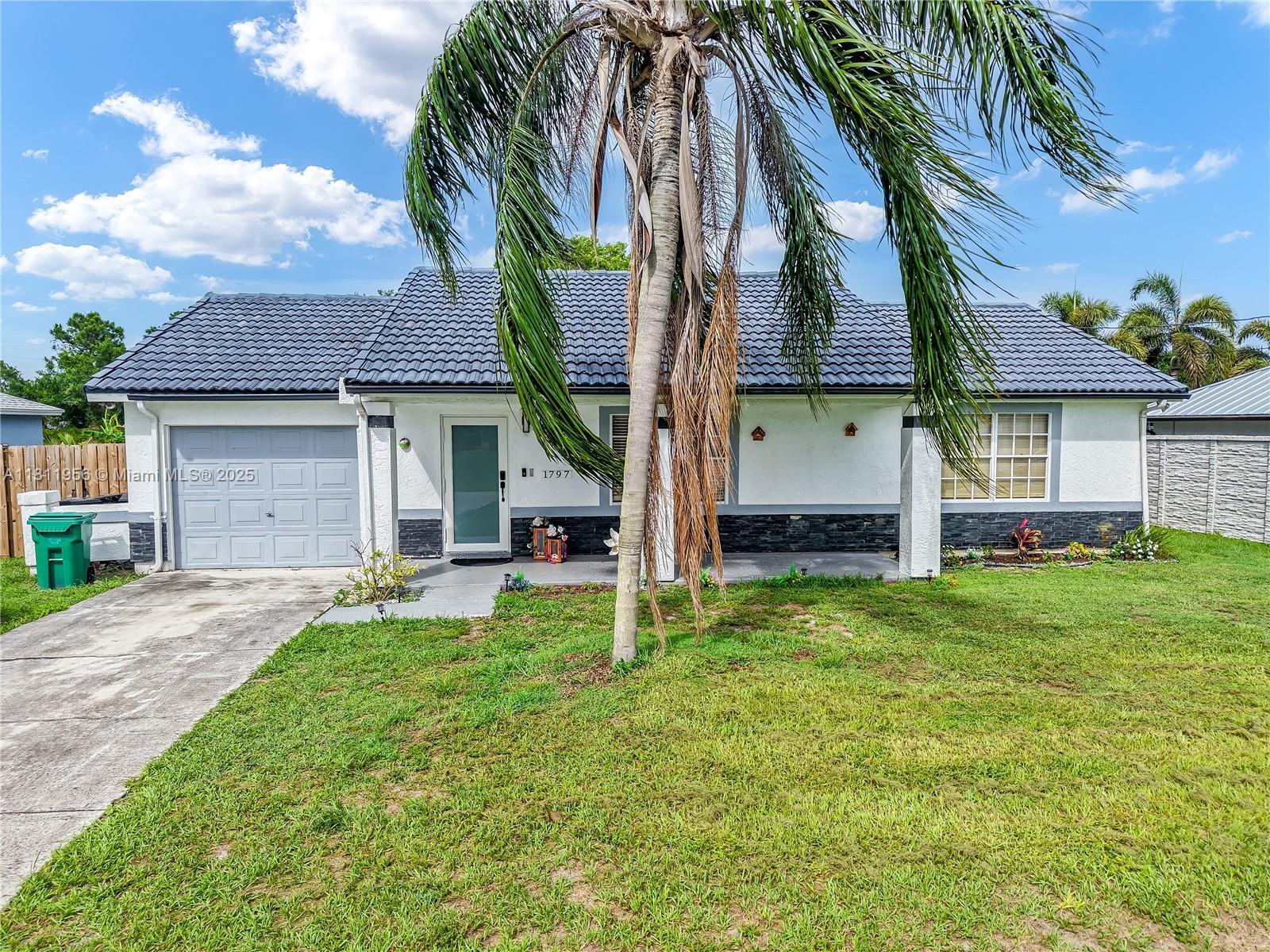 Property Photo: 1797 SW Hampshire Lane FL 34953