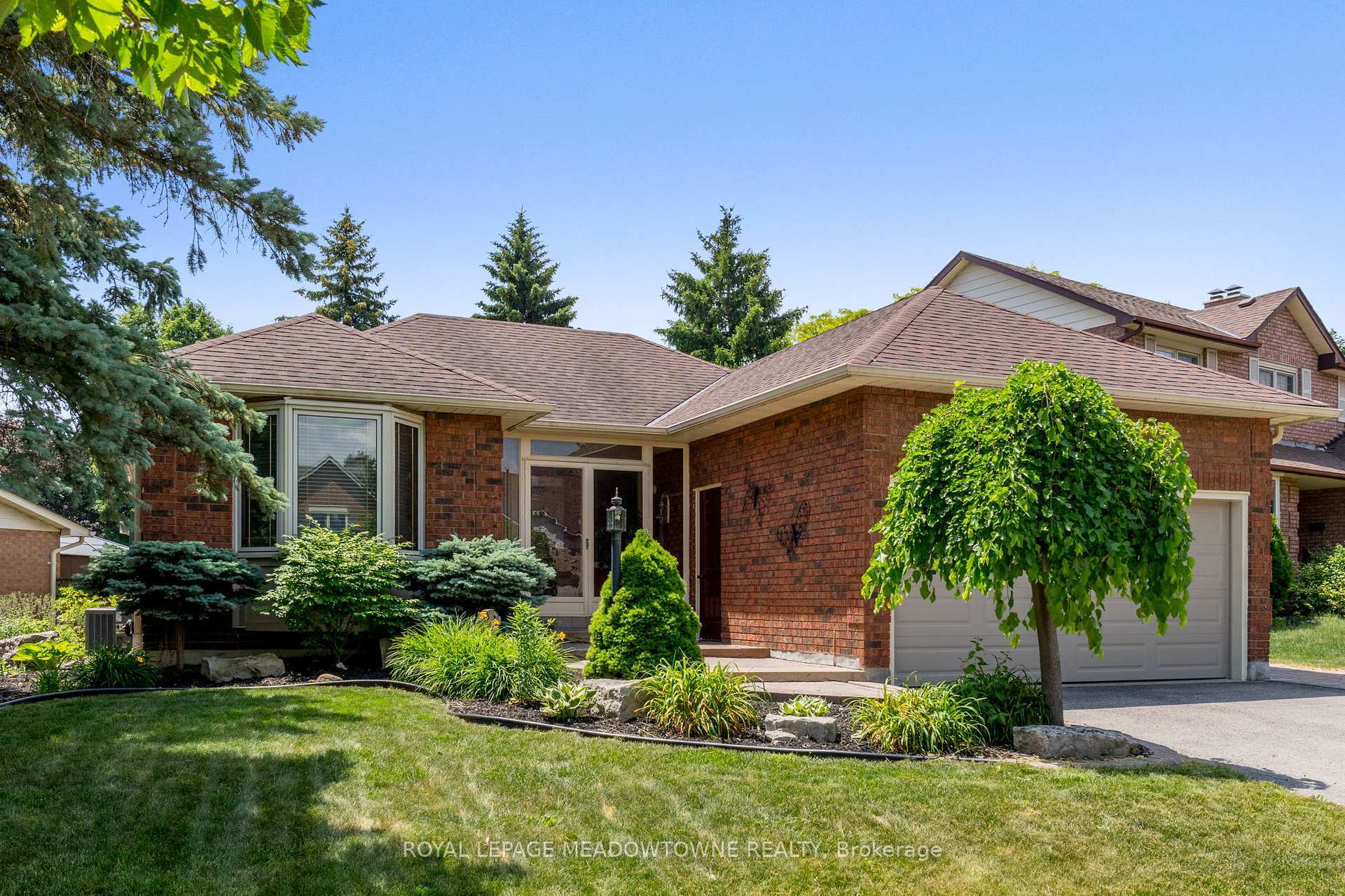 Property Photo: 52 Canadian Oaks Drive ON L1N 6W8