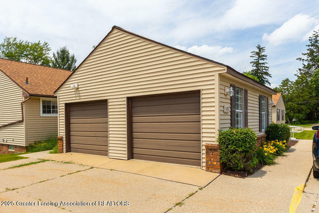 Property Photo:  541 Red Cedar Boulevard  MI 48895 