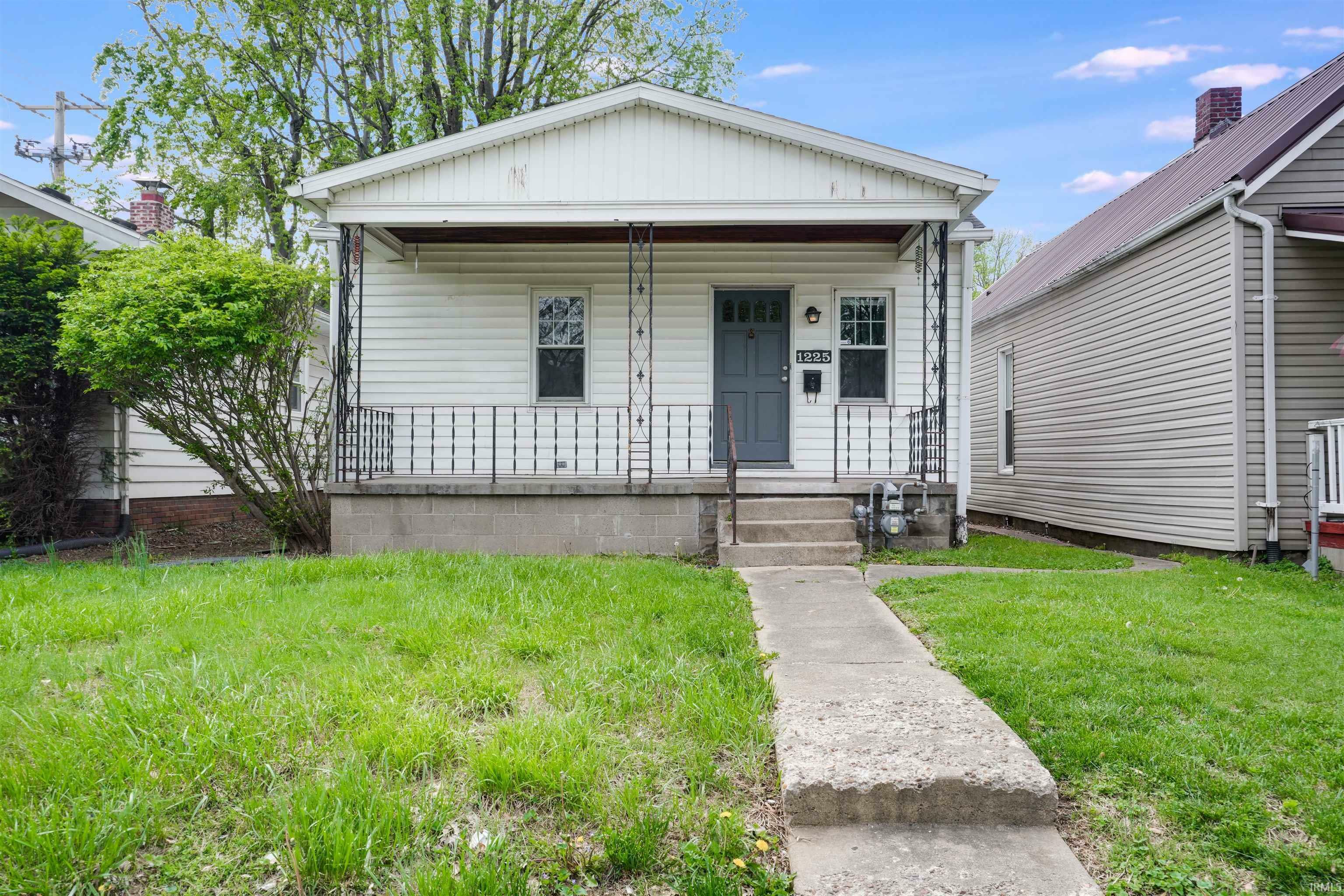 Property Photo: 1225 S Harlan Avenue IN 47714