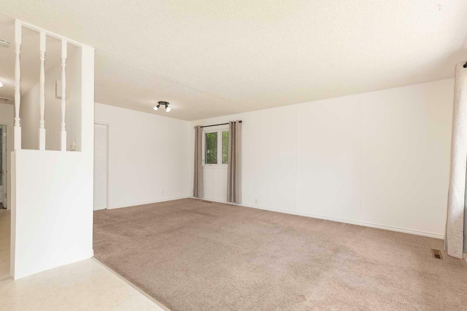 Property Photo: 2115 15 Avenue S AB T1K 0X4