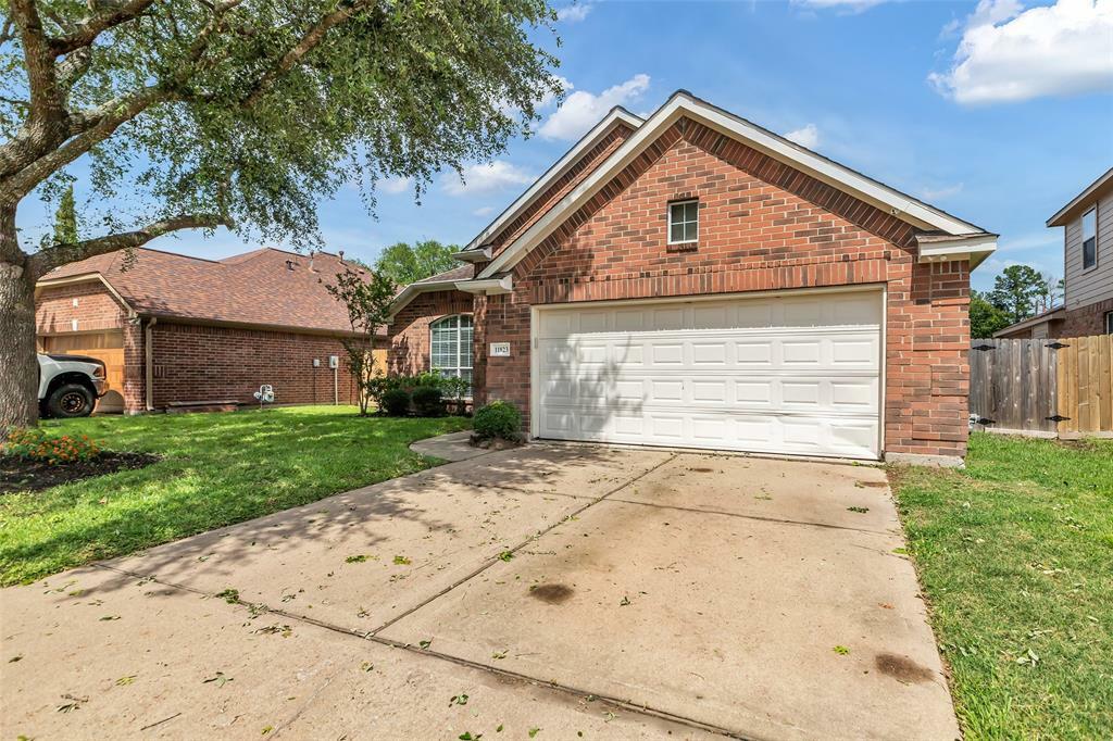 Property Photo: 11823 Lois Lane TX 77362