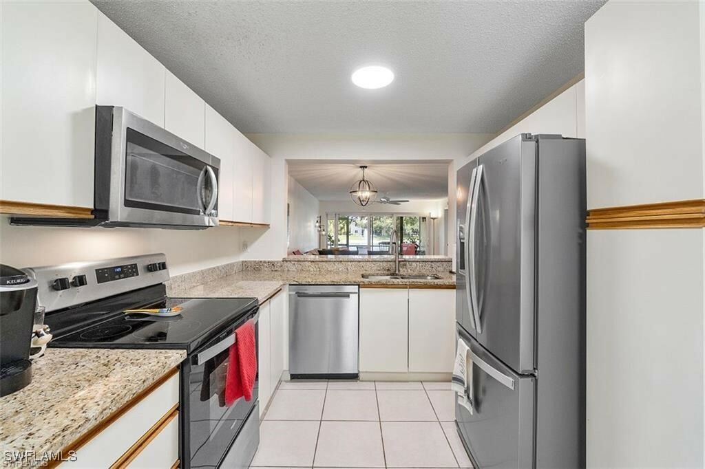 Property Photo:  260 Timber Lake Circle F102  FL 34104 