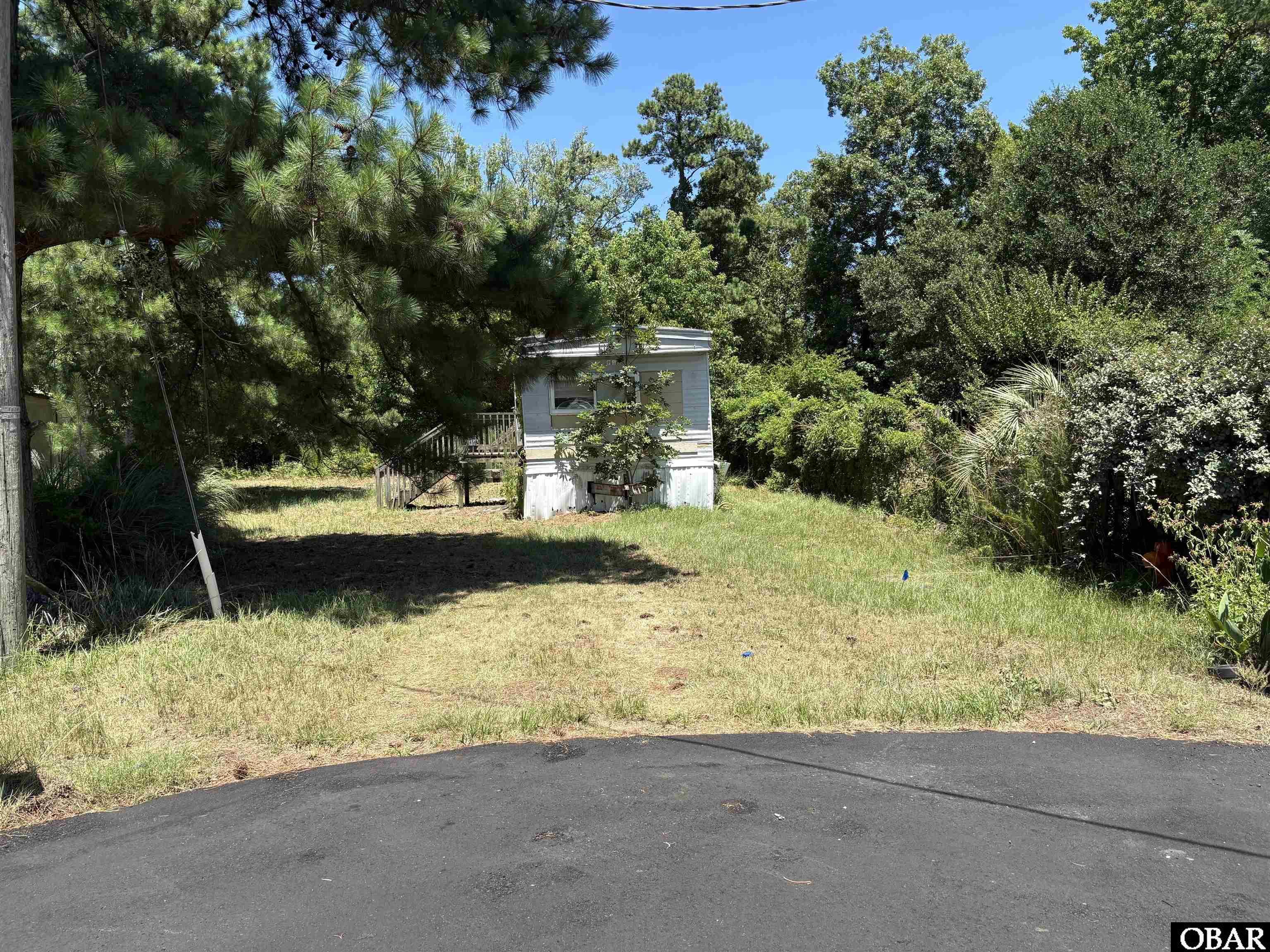 Property Photo:  115 E Swan Court  NC 27948-000 