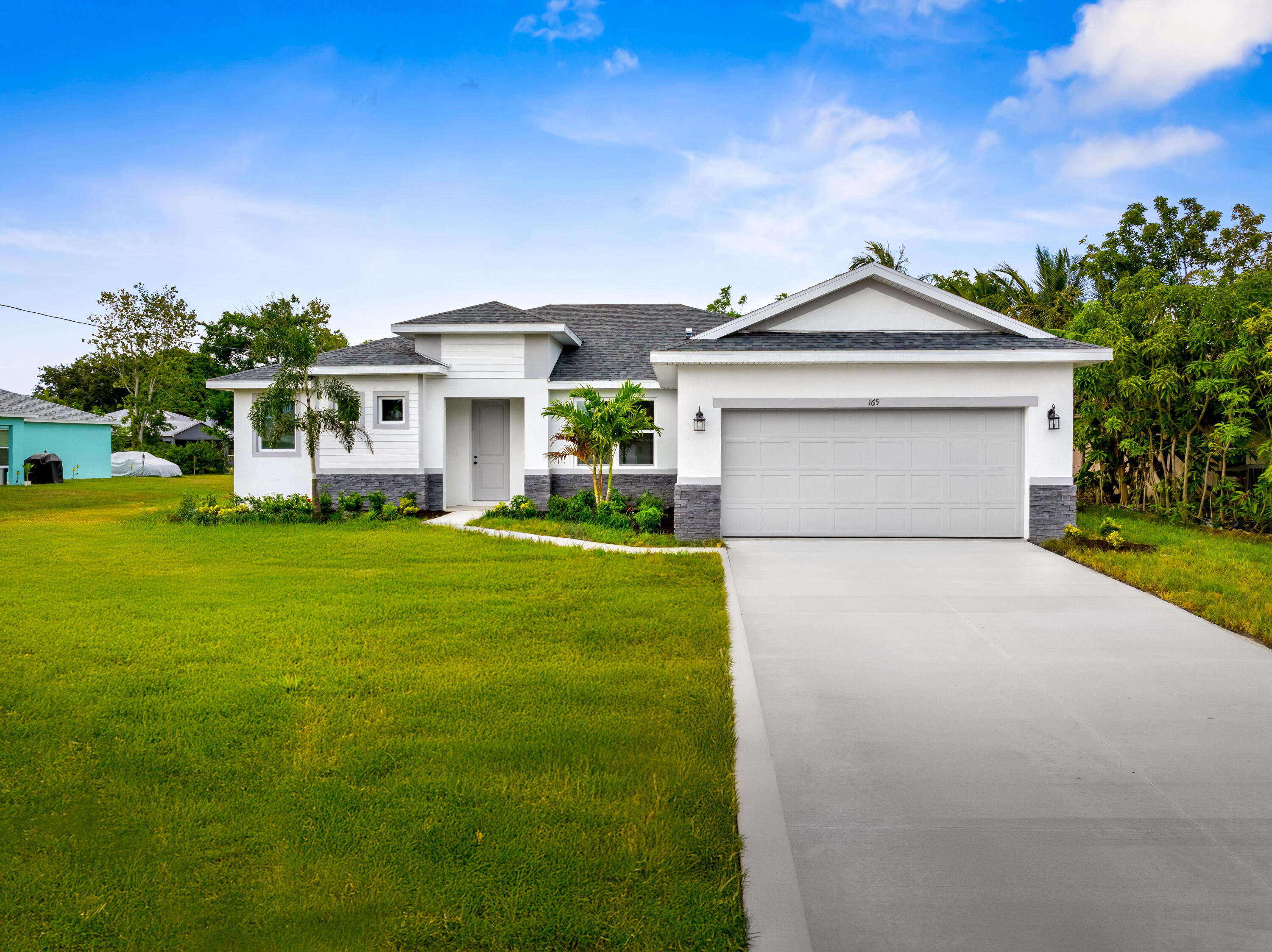Property Photo: 2433 SW Hinchman Street FL 34984