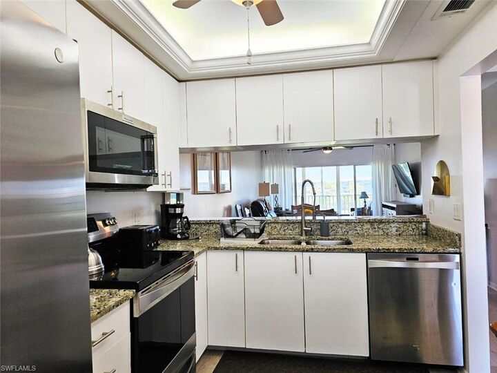 Property Photo:  14811 Hole In One Cir 307  FL 33919 