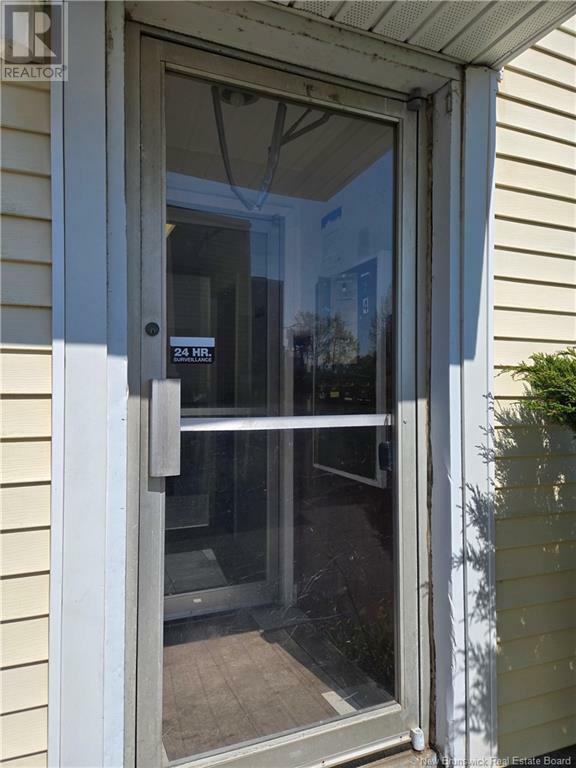 Property Photo:  318-320 Duke Street  NB E2L 1P5 
