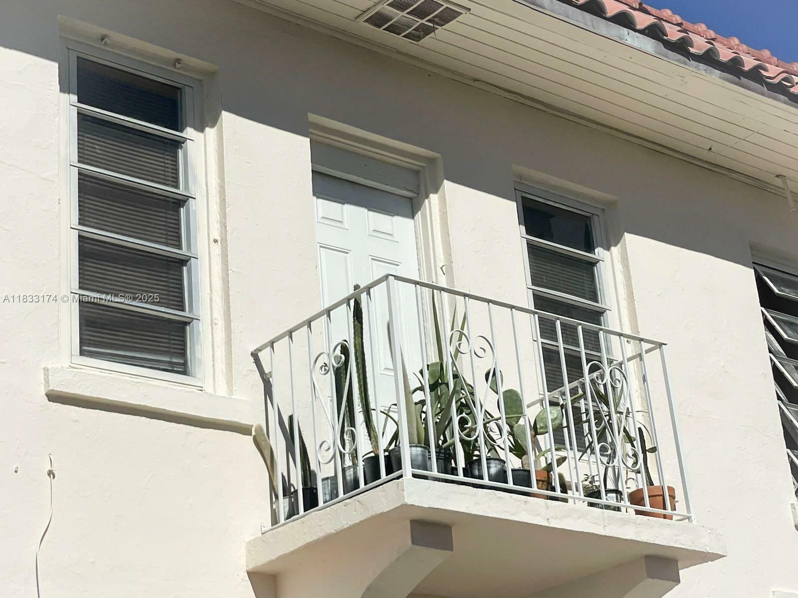 Property Photo:  701 NW 1st St  FL 33128 