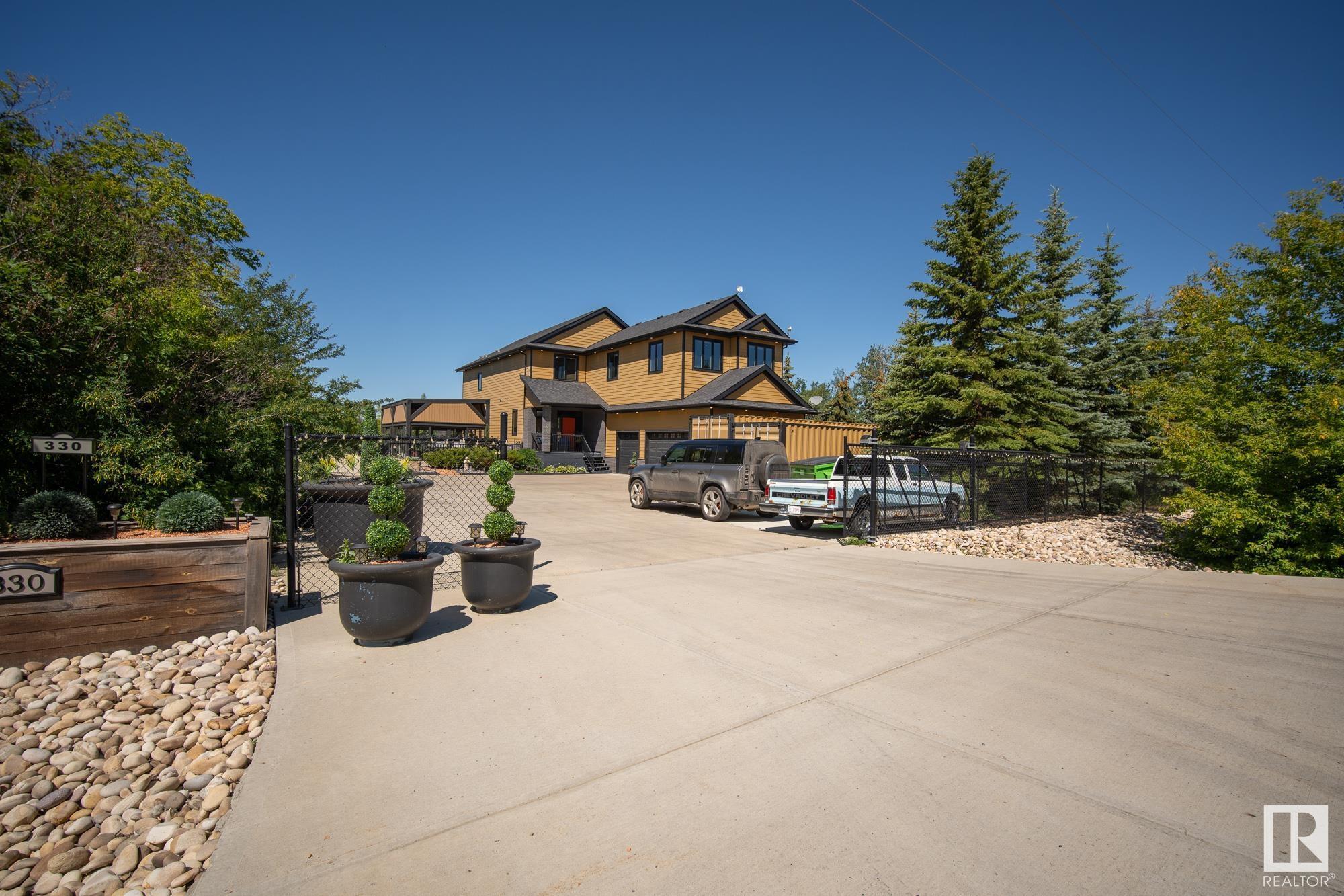 Property Photo: 23549 Twp Road 510 330 AB T4X 0T1