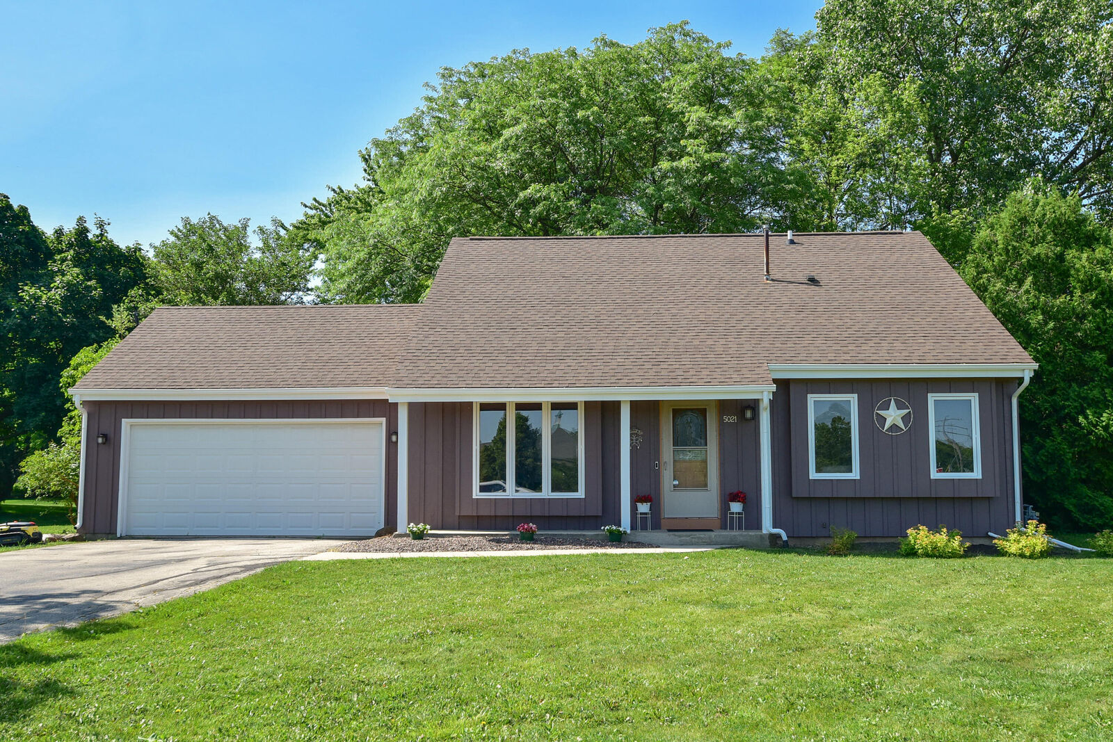 Property Photo:  5021 W Rawson Ave  WI 53132 