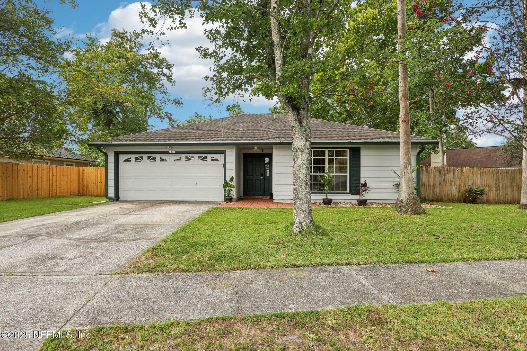 Property Photo:  7076 Swamp Flower Drive  FL 32244 