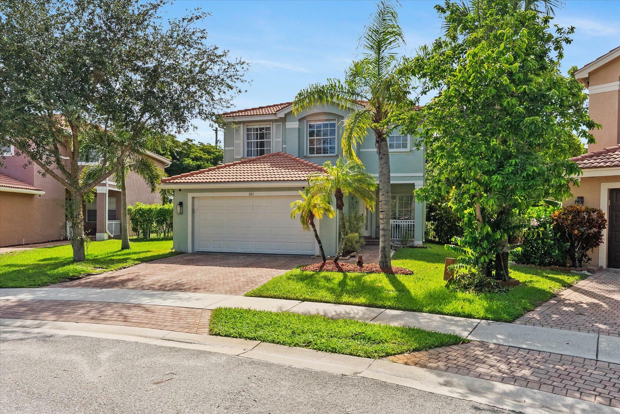 Property Photo: 681 Garden Cress Trail FL 33411