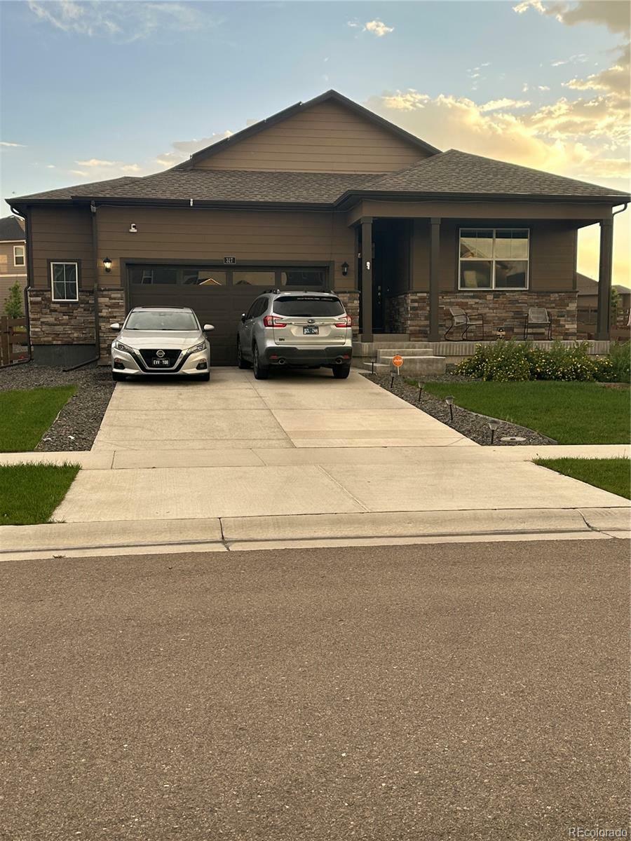 Property Photo: 317 N 64th Avenue CO 80634