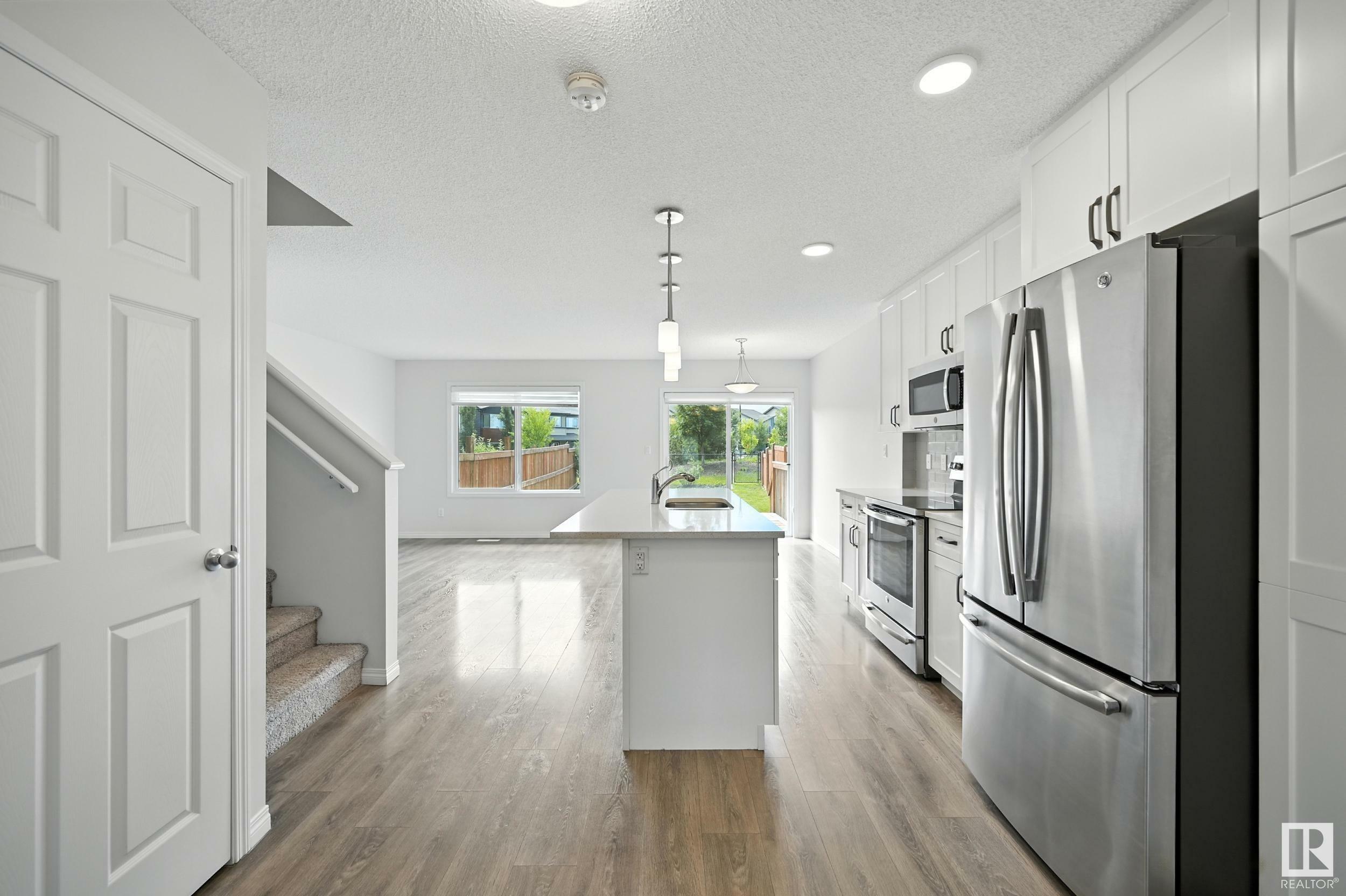 Property Photo: 2077 Price Landing Landing SW AB T6W 3P8