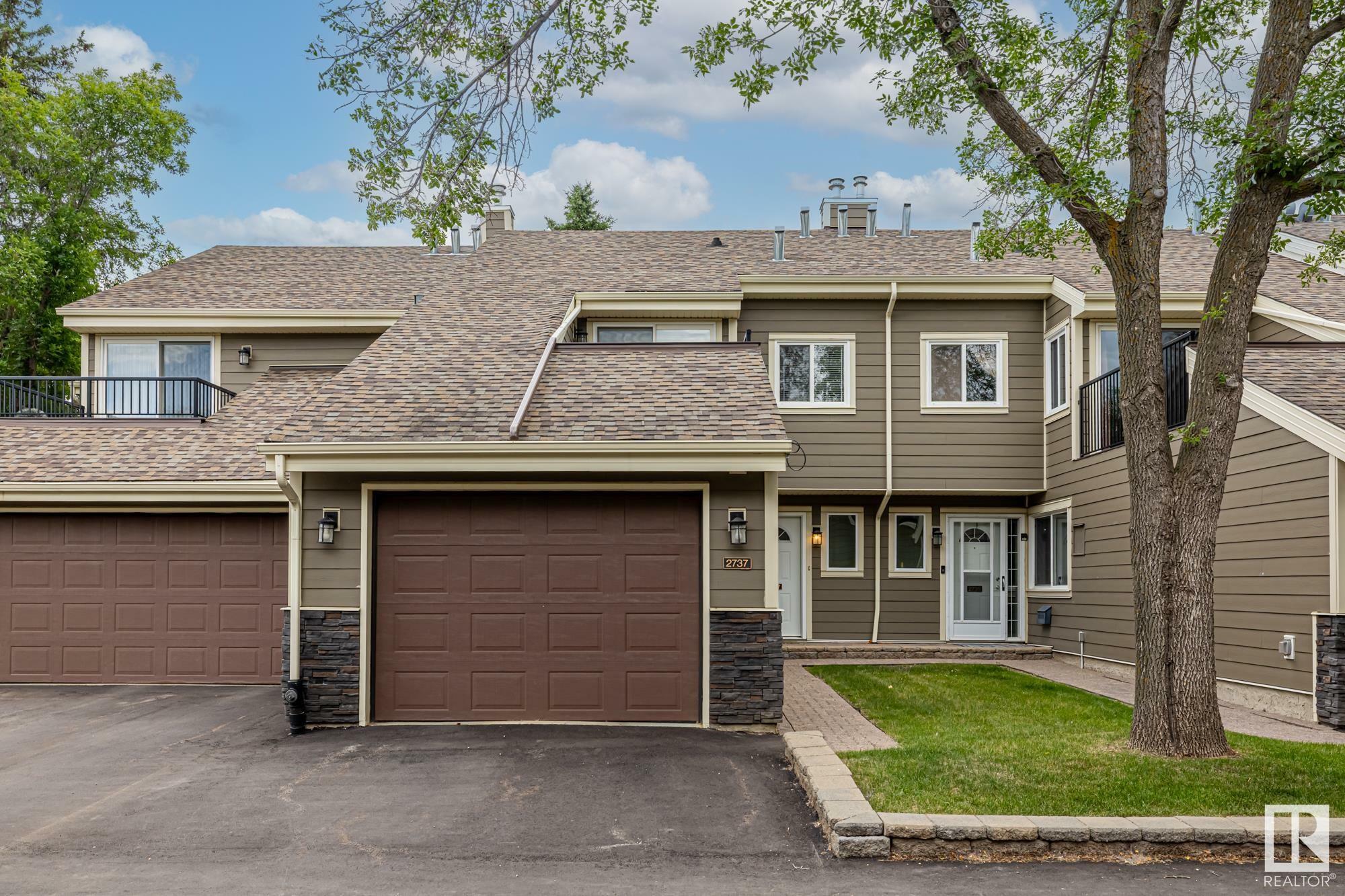Property Photo: 2737 124 Street NW AB T6J 4T2