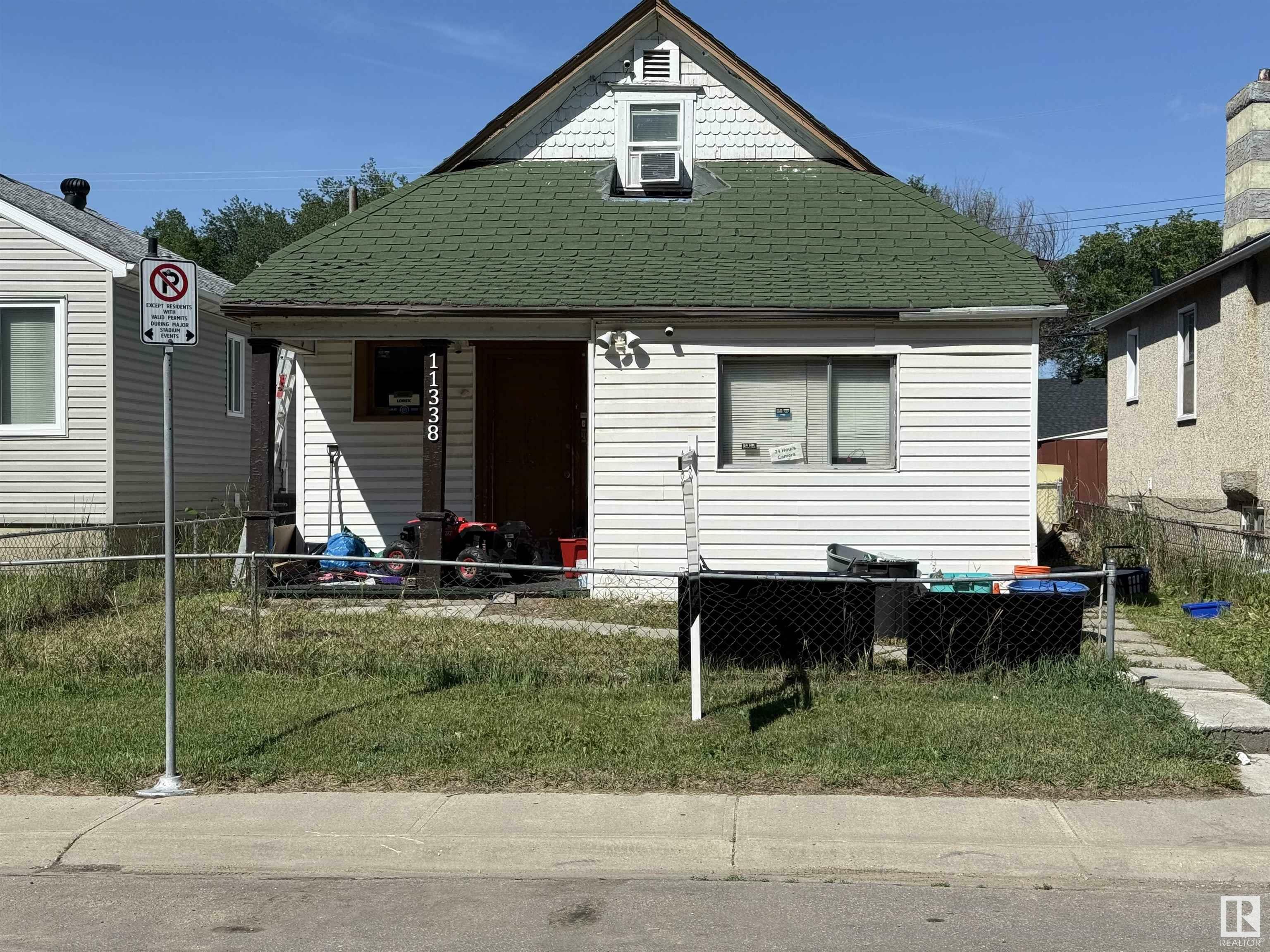 Property Photo:  11338 83 Street NW  AB T5B 2Y1 