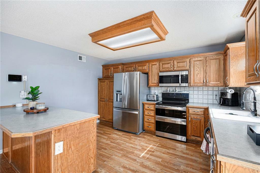 Property Photo:  2417 SW Woodhaven Lane  MO 64082 