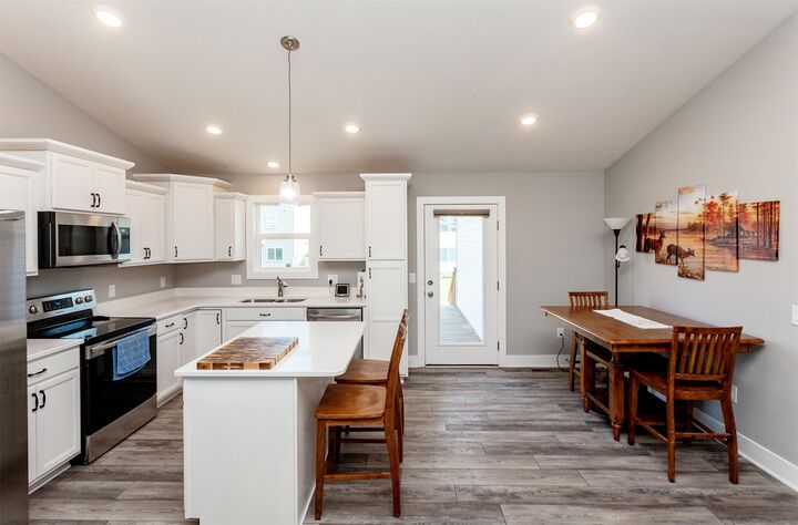 Property Photo:  608 NE 56th Street  IA 50021 
