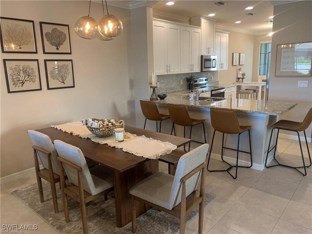 Property Photo: 9433 Benvenuto Court 101 FL 34119
