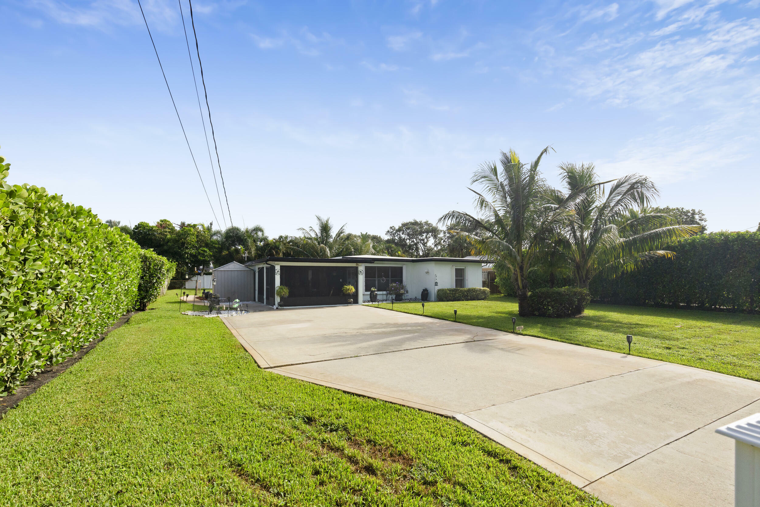 Property Photo: 2417 Country Oaks Lane FL 33410